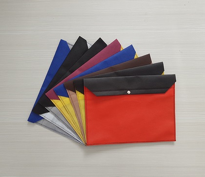 پوشه پارچهای دکمهدار ( اسپان باند ) پوشه پارچهای دکمهدار ( اسپان باند )