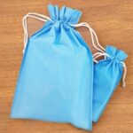 بگ پارچه‌ای با بند جمع‌شو (نخ‌دار)