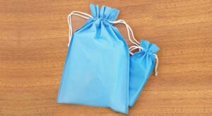 بگ پارچه‌ای با بند جمع‌شو (نخ‌دار)