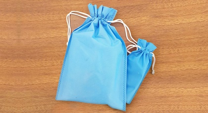 بگ پارچه‌ای با بند جمع‌شو (نخ‌دار)